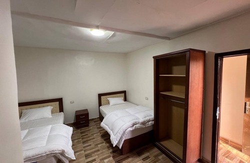 Giza Hotel | pyramids view inn To Pyramids , 4-bedroom hotel with AC and WiFin tranquil Giza