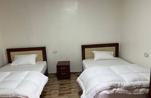 Giza Hotel | pyramids view inn To Pyramids , 4-bedroom hotel with AC and WiFin tranquil Giza