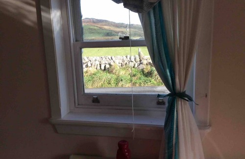 Nerabus Cottage | Quaint and quirky coastal Cottage Islay