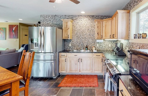 Eureka Springs Cabin | Quaint cabin on Beaver Lake with kayaks, hot tub, firepits, wood stove, grill