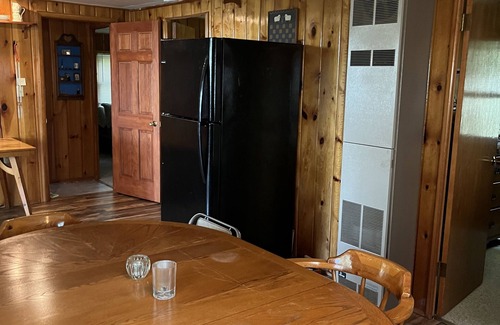 Kalkaska Cottage | Quaint Family lake cottage w/beach, dock,internet on all sports Crawford Lake