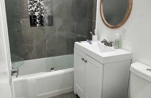Hialeah House | Queen bed, shared restroom