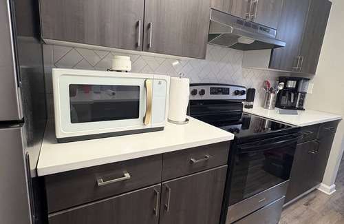 Tampa Apartment | Queen Suite Upscale Comfort + Privacy