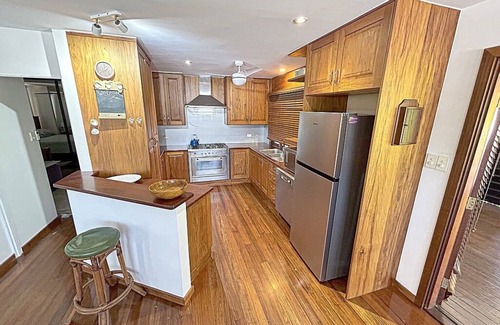 Whitfield Apartment | Queenslander apartment with plenty of space and very tropical.Sleeps six people.