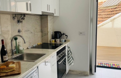 Santo Condestavel Apartment | Quiet 2 BD with Terrace in Campo de Ourique