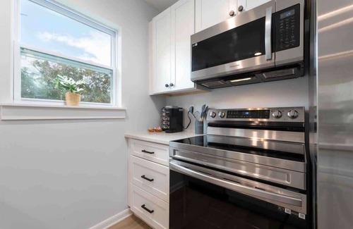 Neptune Beach Apartment | Quiet beach oasis, walk to the beach!