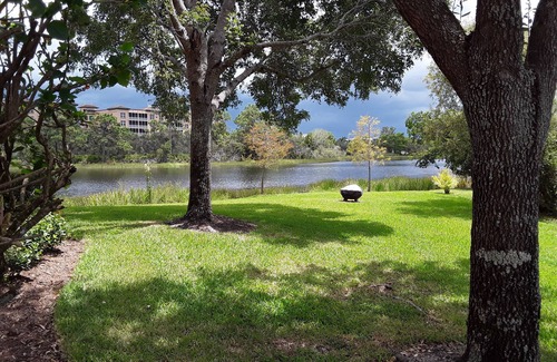 Bonita Shores Condo | Quiet ground floor, corner unit on the lake minutes from Barefoot Beach