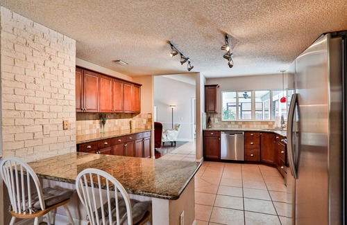 Palm Coast House | Quiet home with enclosed yard, heated pool with jets, & screened lanai