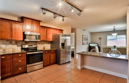 Palm Coast House | Quiet home with enclosed yard, heated pool with jets, & screened lanai