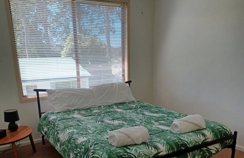 Batehaven House | Quiet House, amongst spotted gum trees, just minutes from beaches & shops.