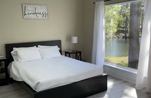 Jesup House | Quiet lake front property in peaceful neighborhood setting.