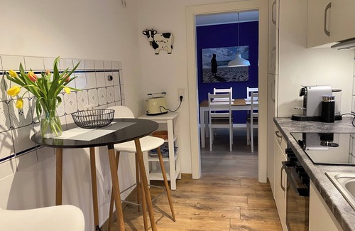 Osterhusum House | Quiet semi-detached house with garden and garage in Husum on the North Sea