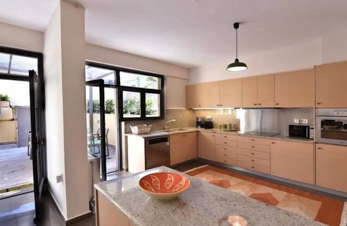 Filopappou Villa | R 963 Villa Cletus Philopappou with 65-inch flat-screen TV, Jetted bathtub & Fireplace.