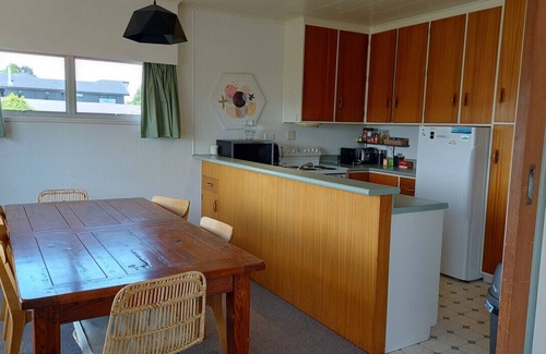 Rainbow Point House | Rainbow Point Pad - Large elevated bach with lake and mountain views, Free Wi-Fi