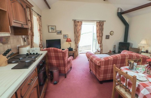 Wigton Cottage | RAMBLING ROSE COTTAGE, with open fire in Caldbeck