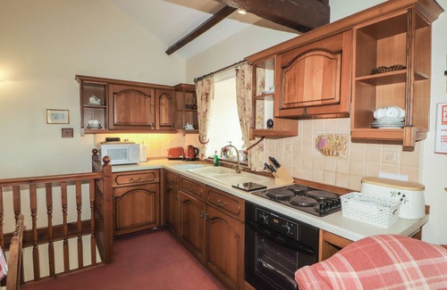 Wigton Cottage | RAMBLING ROSE COTTAGE, with open fire in Caldbeck
