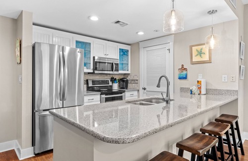 Baytowne Wharf Condo | RARE Condo at Baytowne! Steps to Wharf, Tropical Pool, Hot Tub, Tram to Beach