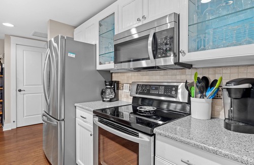 Baytowne Wharf Condo | RARE Condo at Baytowne! Steps to Wharf, Tropical Pool, Hot Tub, Tram to Beach