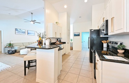 Central Naples Villa | Rare Find! Tropical Garden Lux Villa -heated pool and spa-12 min from the beach!