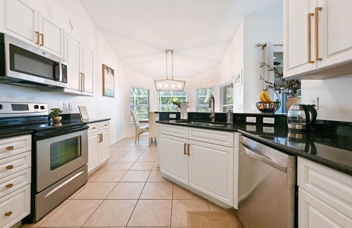 Central Naples Villa | Rare Find! Tropical Garden Lux Villa -heated pool and spa-12 min from the beach!