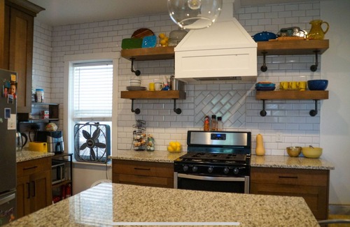 Ogden House | Recently Renovated Brick Bungalow in Historic Neighborhood.