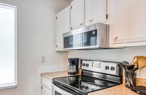 Royal Pines House | Recently renovated home in quiet location with decks, WiFi, fireplace, AC, & W/D