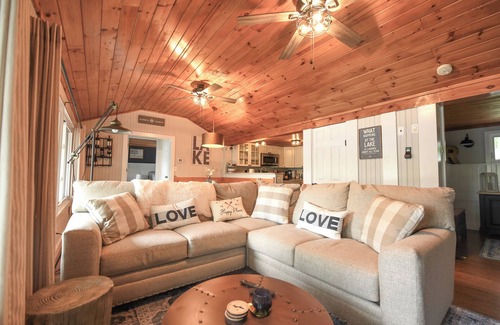 Oxford House | Recently updated home on Thompson Lake with gorgeous sandy beach!