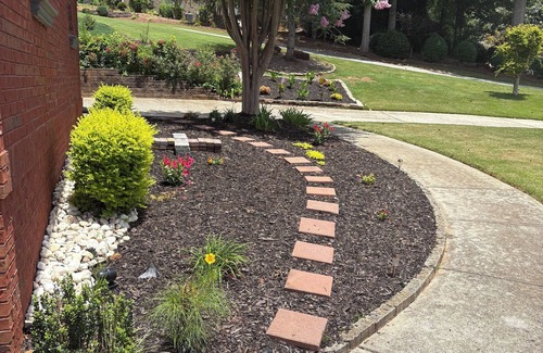Braselton Apartment | Recharge here. One large bedroom within a furnished, terrace level apartment.