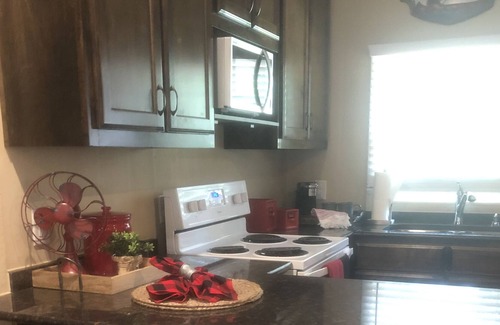 Bryan County Cabin | Red Cabin and RV parking with Access to the Red River
