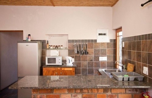 Oudtshoorn Cottage | Red Stone Hills