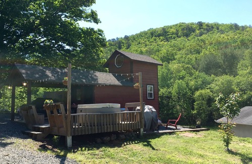 Clayton House | Red Tiny House In The Mountains - waterfall, jacuzzi and stunning farm views