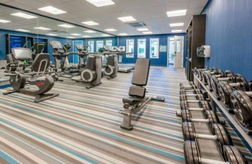 Cupertino House | Redefining travel with weekly live music & poolside yoga!