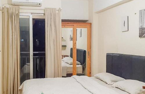 Serpong Hotel | RedLiving Apartemen Serpong Green View - Farida Property