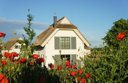Kreptitz House | Reetdachhäuser am Bakenberg