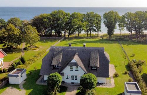 Lobbe Villa | Reethus am Strand - Haushälfte 2 mit Kamin, Sauna
