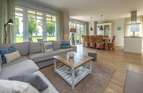 Lobbe Villa | Reethus am Strand - Haushälfte 2 mit Kamin, Sauna