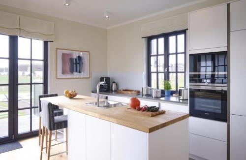 Dranske House | Reetland am Meer - LuxusPlus Reetdachvilla mit 4 Schlafzimmern und Kamin G08