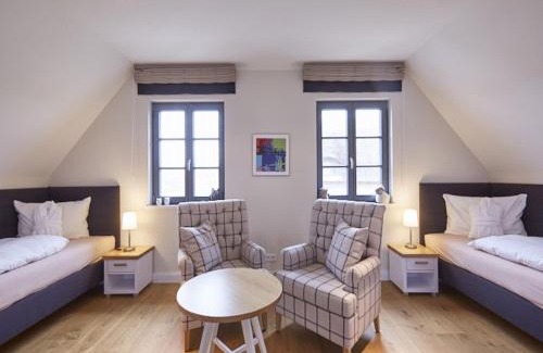 Kreptitz House | Reetland am Meer - Premium Reetdachvilla mit 2 Schlafzimmern, Sauna und Kamin E22