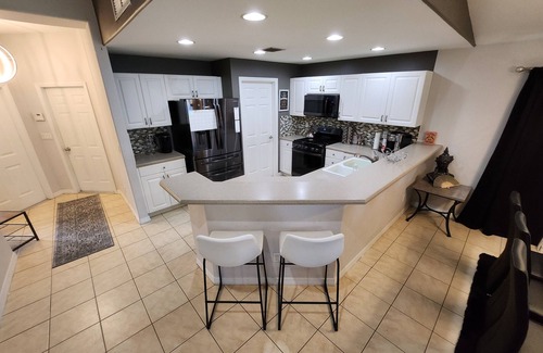 Cascades House | Refreshing Lake View Home in Upscale Estero Community