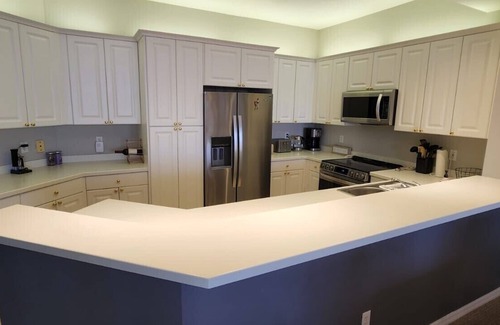 Pelican Bay Condo | Regatta at Vanderbilt is an upscale condo - a 7 minute walk to the beach!