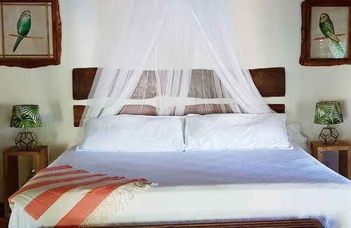 Samana Cabin | Regenerative tropical lodge with chic details , steps away from the beach.