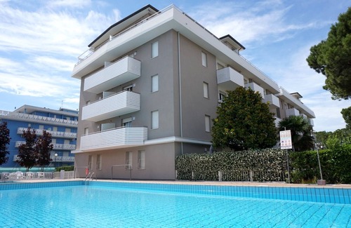 Porto Santa Margherita Apartment | Relax and enjoy a garden and pool