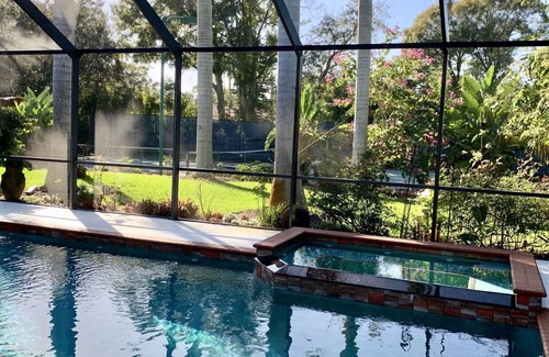South Sarasota House | Relax and Play: Private Pool, Hot Tub, Tennis, Basketball on 1 acre in Sarasota.