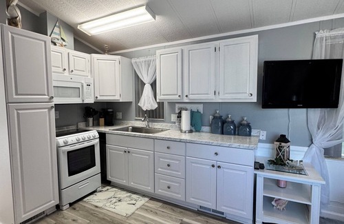 Live Oak Landings House | Relax and unwind in our inviting 55+ Mobile Home park, on the Gulf and the Bay,