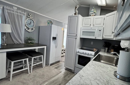 Live Oak Landings House | Relax and unwind in our inviting 55+ Mobile Home park, on the Gulf and the Bay,