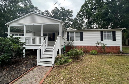Bracey House | Relax at this Golf Community House with nearby water access!