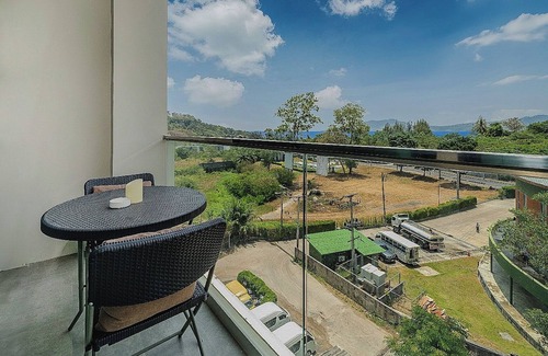 Patong Condo | Relax in a Spacious Deluxe King Room with Mountain &Distant Sea View