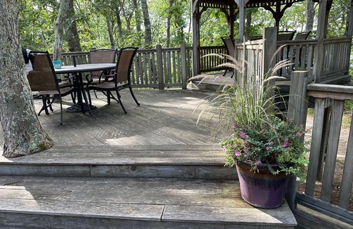 Harwich House | Relax in a tranquil log home on direct lake front property. The Hermitage awaits