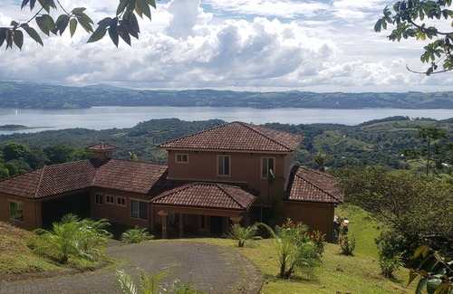 Arenal Villa | Relax in Jacuzzi with panoramic Views of Lake arenal after a day of adventure