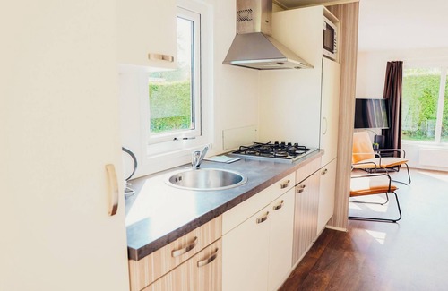 Voorthuizen House | Relax in the Veluwe Lodge with private sauna! Luxury, nature, and comfort come together at De Boshoek for a perfect getaway.